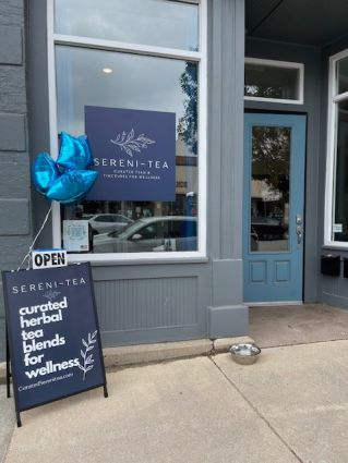 Store front of Sereni-Tea Shop/ Blue Door and Blue Building