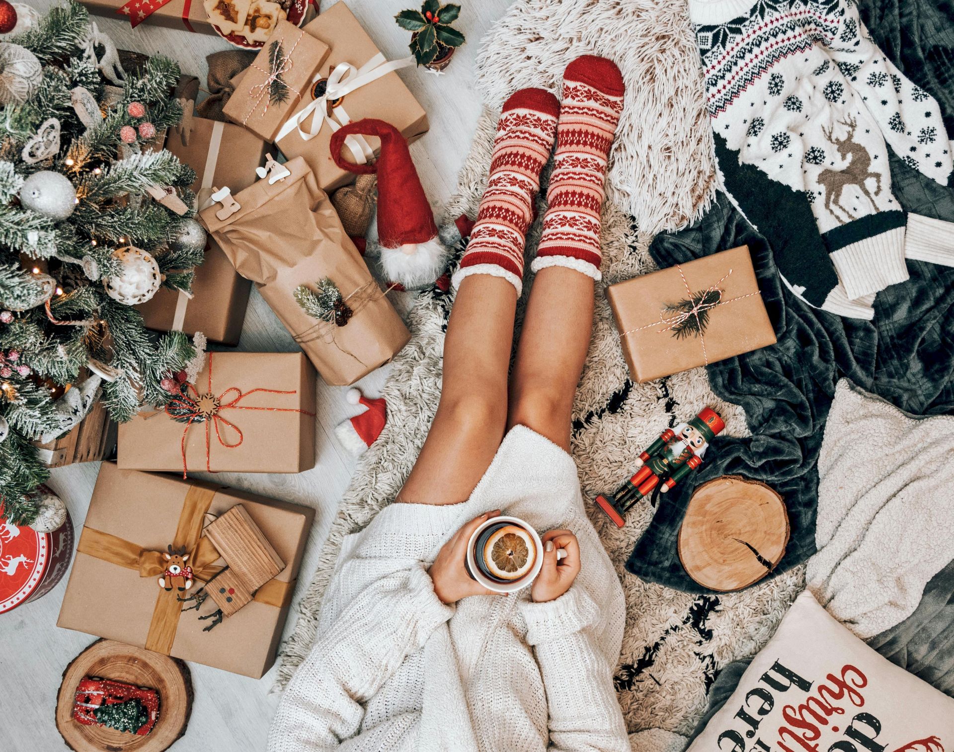 Enjoy a relaxing Christmas morning with festive decor, gifts, and a cozy mug of tea.